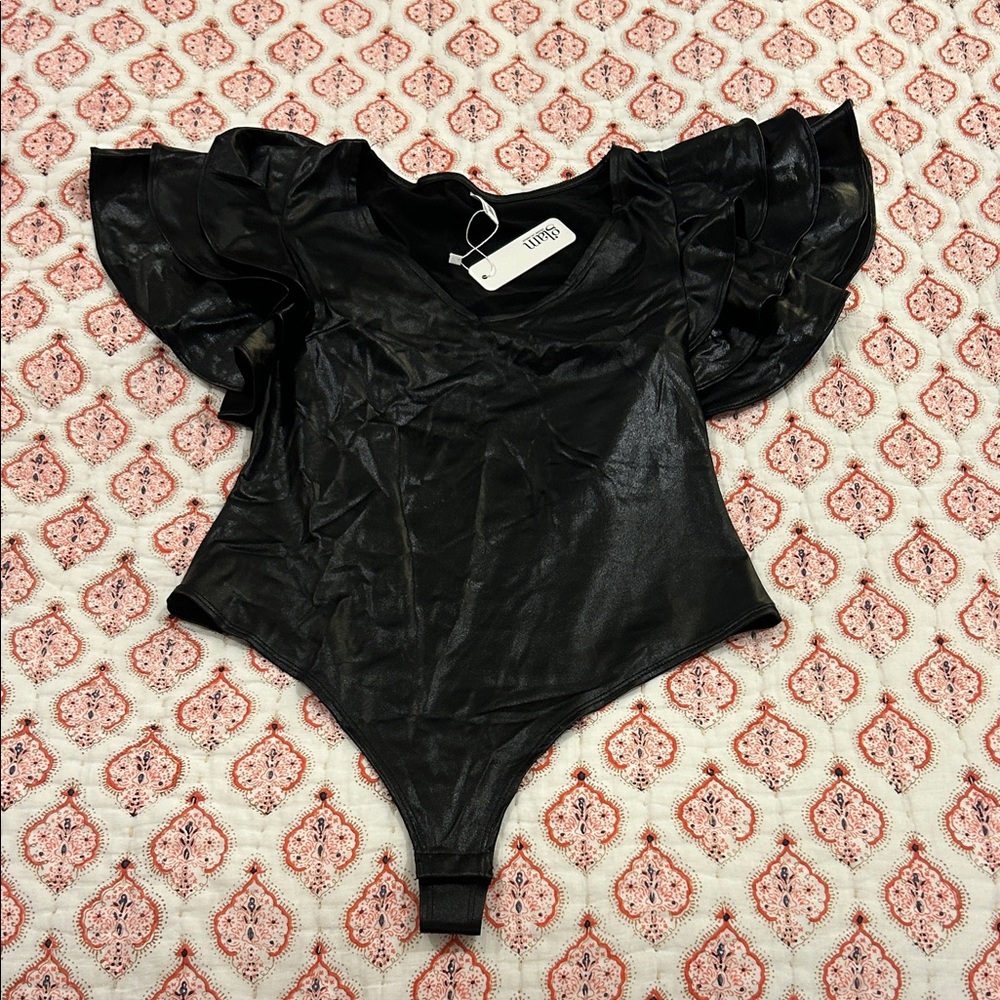 Black shiny/faux, leather type material thong bodysuit with ruffle sleeves